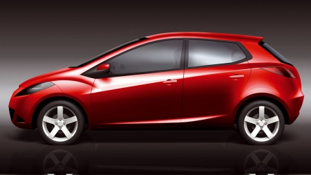 Gyönyörű fény-árnyék játék a törésvonalak mentén. Jó formában a Mazda2.