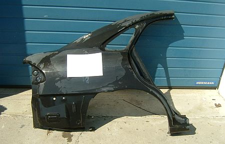 Mazda 626 1997-tól jobb hátsó sárvédő.