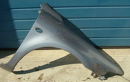 Mazda6 2002-2008 jobb első sárvédő.