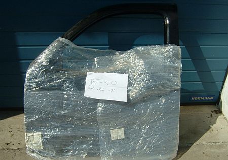 Mazda BT-50 bal első ajtó.