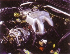 Az atmoszférikus feltöltésű Mazda 13B 6PI DEI-II. a második generációs Mazda RX-7-ben.