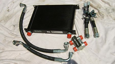 Az olajhűtő, a csövek, illetve a termosztát. Mazda RX-8 mazda-auto 3. fázis. Az új olajhűtő, a csövek, illetve a termosztát. Mazda RX-8 mazda-auto 3. fázis.